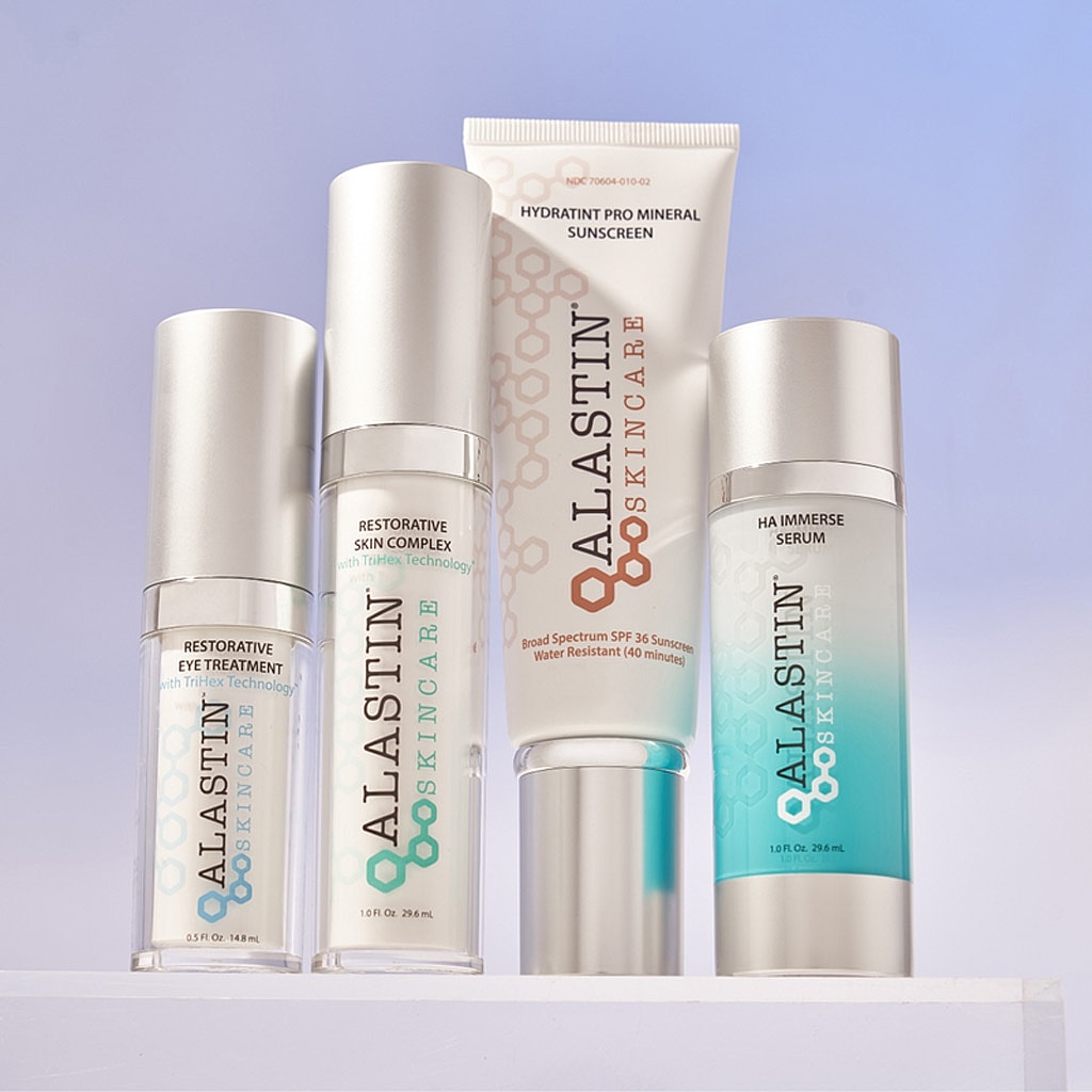 Alastin skincare products displayed on a shelf.