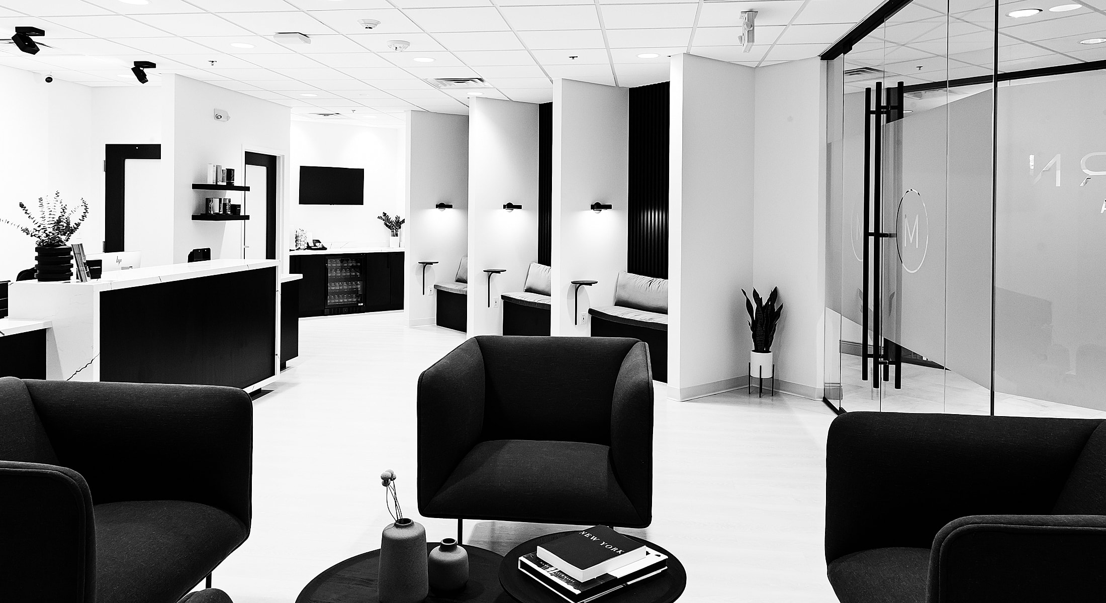 Modern minimalist waiting area in black and white.