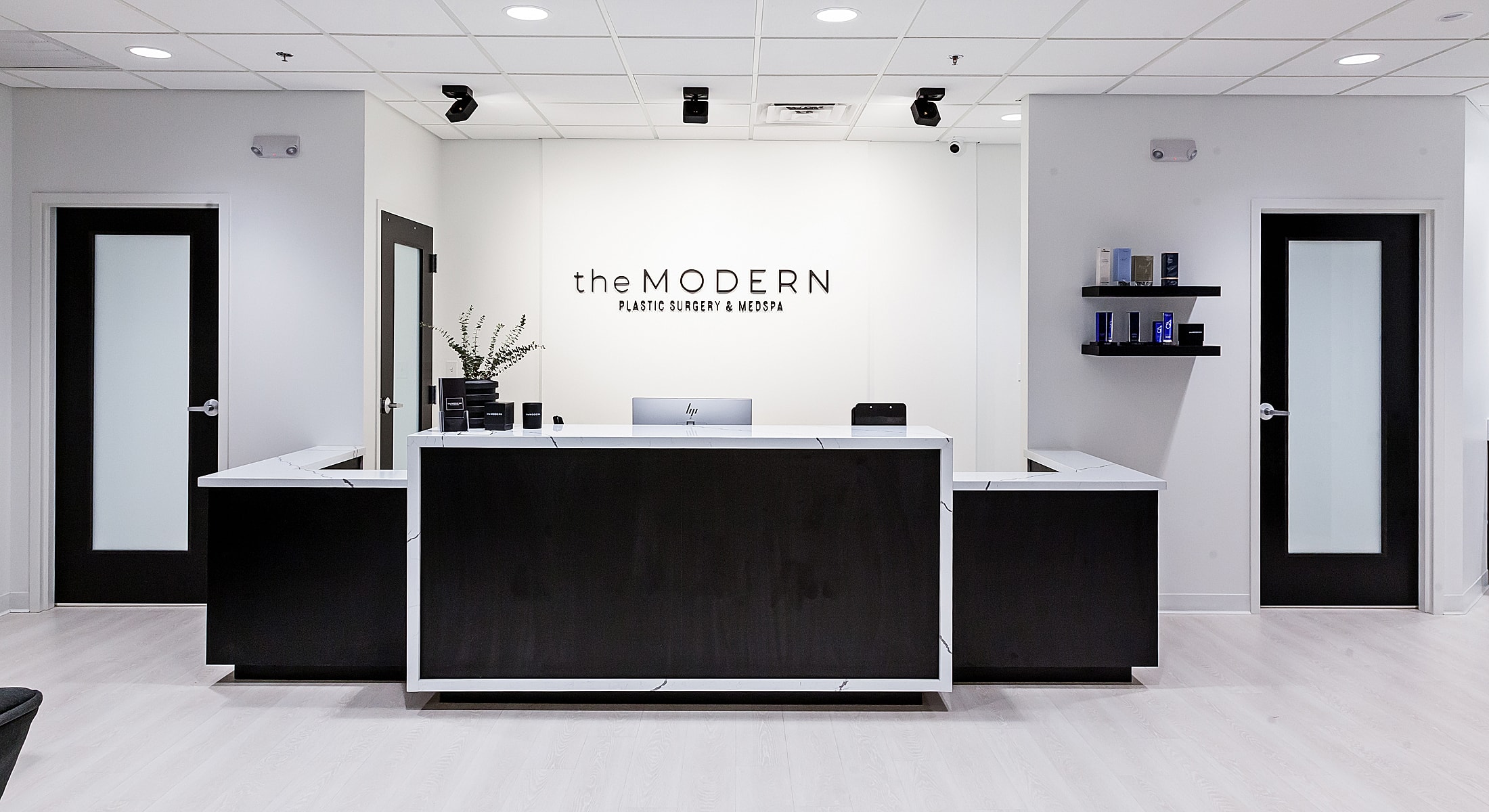 Modern plastic surgery and medspa reception area.